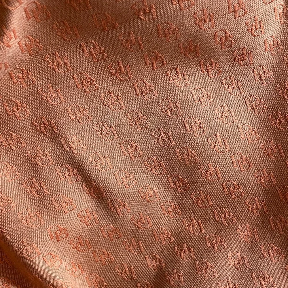 Dooney & Bourke Vintage burnt Orange over the shoulder bucket Bag